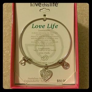 NIB stainless steel bangle with charms